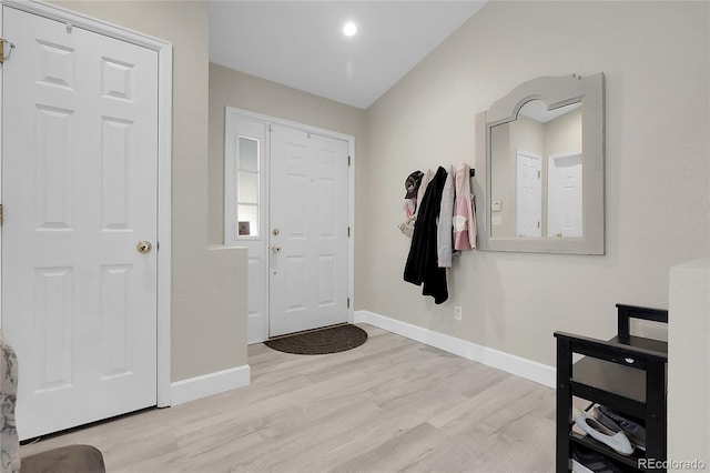 12585 S Beaver Creek Way, Parker, CO 80134 - entrance foyer with wood finished floors and baseboards