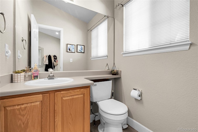 12585 S Beaver Creek Way, Parker, CO 80134 - bathroom with vanity and toilet