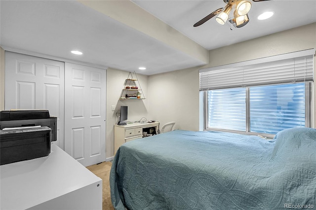 12585 S Beaver Creek Way, Parker, CO 80134 - bedroom with light carpet, recessed lighting, a ceiling fan, and a closet