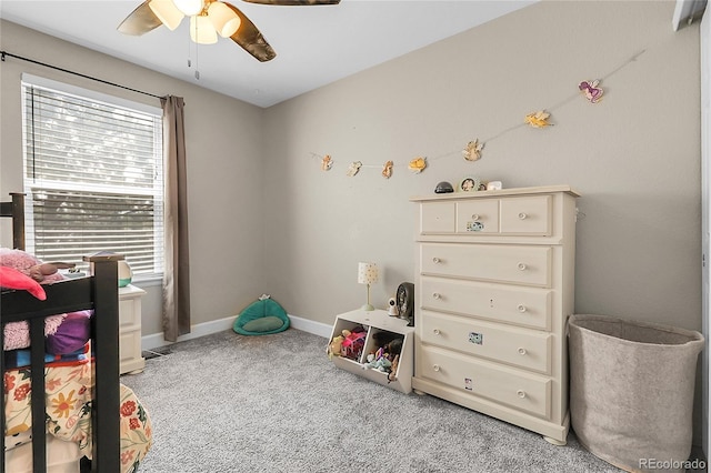 12585 S Beaver Creek Way, Parker, CO 80134 - bedroom featuring light carpet, multiple windows, and a ceiling fan