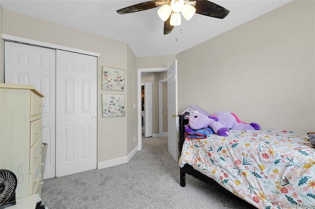 12585 S Beaver Creek Way, Parker, CO 80134 - bedroom with light colored carpet, washer / clothes dryer, a closet, and a ceiling fan