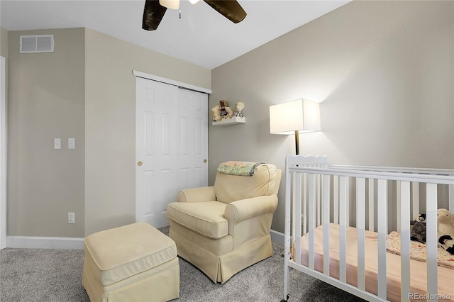12585 S Beaver Creek Way, Parker, CO 80134 - bedroom featuring carpet floors, a closet, ceiling fan, and a nursery area