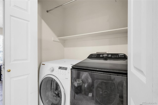 12585 S Beaver Creek Way, Parker, CO 80134 - laundry room with washing machine and clothes dryer