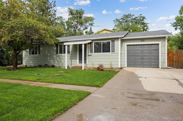 ranch-style house with a front lawn and a garage