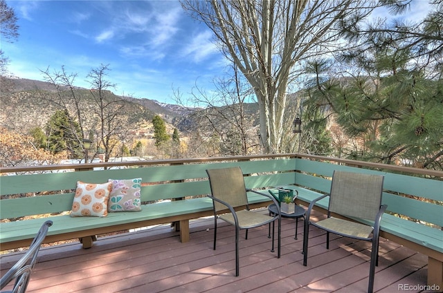 deck with a mountain view