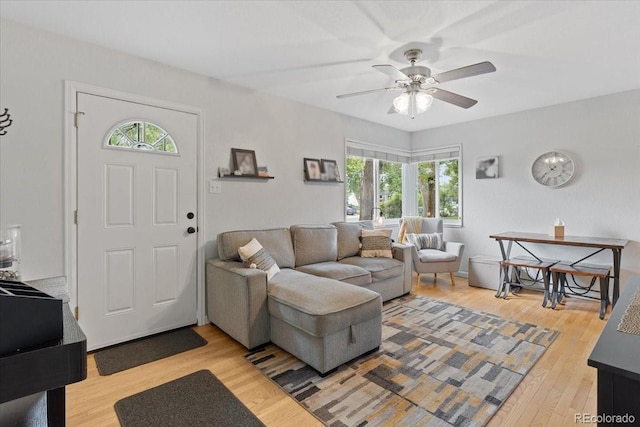 2967 Olive St, Denver, CO 80207 - living room featuring ceiling fan and light wood-style flooring