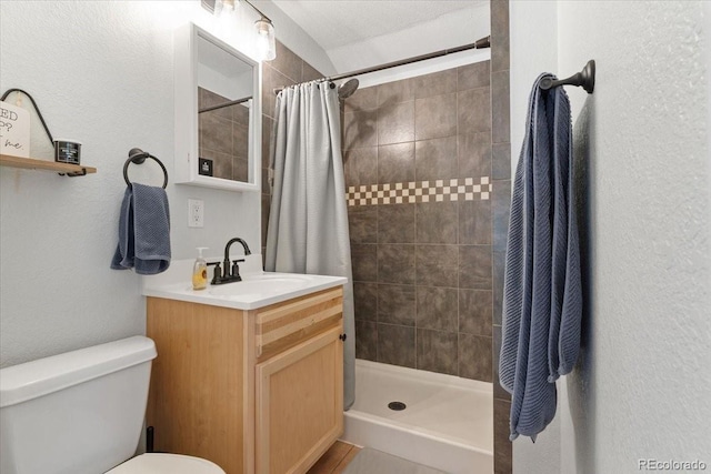 2967 Olive St, Denver, CO 80207 - full bath with toilet, vanity, and tiled shower