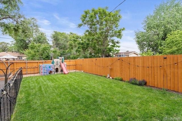 2967 Olive St, Denver, CO 80207 - view of yard with a playground