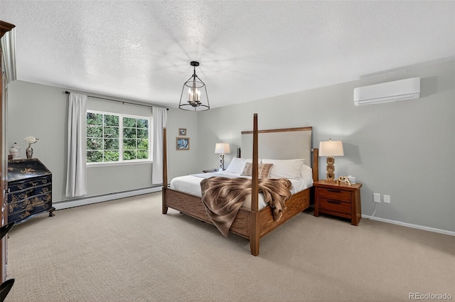 20854 State Highway 96, Wetmore, CO 81253 - bedroom with an AC wall unit, a baseboard heating unit, light carpet, and a textured ceiling