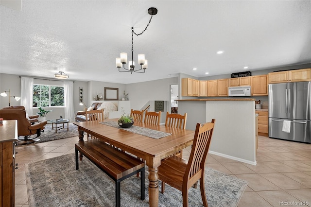 20854 State Highway 96, Wetmore, CO 81253 - dining area featuring light tile patterned floors, a chandelier, and recessed lighting