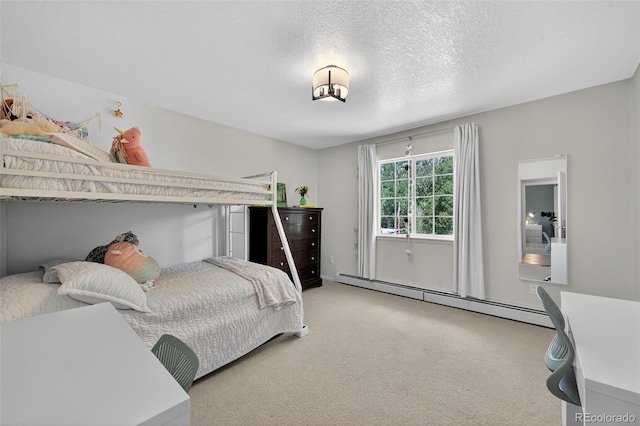 20854 State Highway 96, Wetmore, CO 81253 - carpeted bedroom featuring a baseboard radiator and a textured ceiling