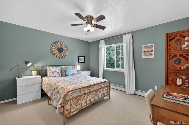 20854 State Highway 96, Wetmore, CO 81253 - carpeted bedroom with a baseboard radiator, a textured ceiling, and ceiling fan