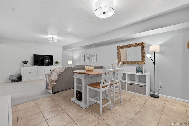 20854 State Highway 96, Wetmore, CO 81253 - dining area with a textured ceiling and light tile patterned floors