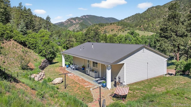 20854 State Highway 96, Wetmore, CO 81253 - rear view of house featuring a patio area and a mountain view
