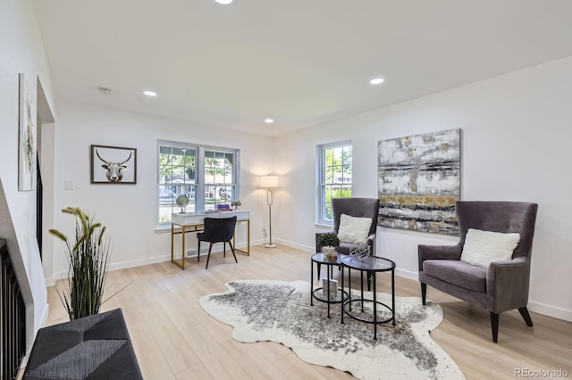 3374 S Niagara Way, Denver, CO 80224 - sitting room with light wood-style flooring, a desk, and recessed lighting