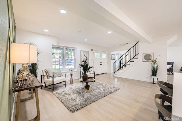 3374 S Niagara Way, Denver, CO 80224 - living room featuring light wood-style floors, stairway, and recessed lighting