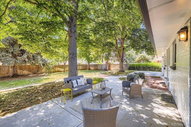 3374 S Niagara Way, Denver, CO 80224 - fenced backyard with a patio and an outdoor hangout area