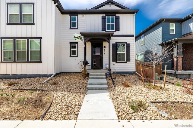 8358 Howell St Unit B, Arvada, CO 80005 - view of front of property featuring board and batten siding