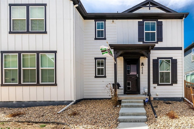 8358 Howell St Unit B, Arvada, CO 80005 - view of front facade with board and batten siding