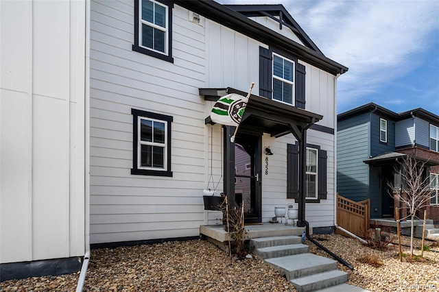 8358 Howell St Unit B, Arvada, CO 80005 - view of front of home featuring board and batten siding