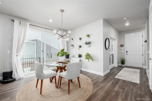 8358 Howell St Unit B, Arvada, CO 80005 - dining space with dark wood-style flooring, a chandelier, and recessed lighting