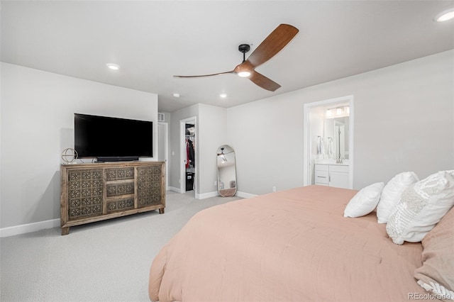 8358 Howell St Unit B, Arvada, CO 80005 - bedroom with a spacious closet, recessed lighting, carpet floors, ensuite bathroom, and a ceiling fan