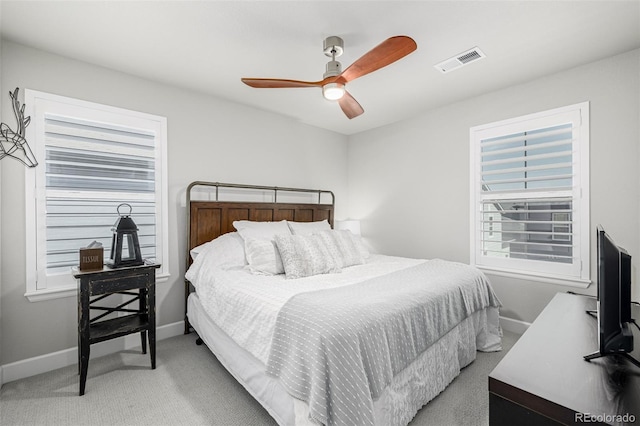 8358 Howell St Unit B, Arvada, CO 80005 - bedroom featuring light colored carpet and a ceiling fan