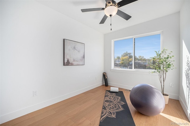 living area with light hardwood / wood-style flooring and ceiling fan