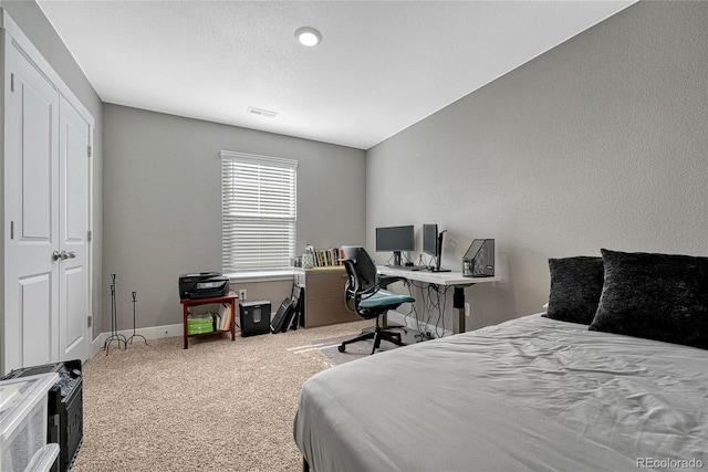 bedroom featuring carpet