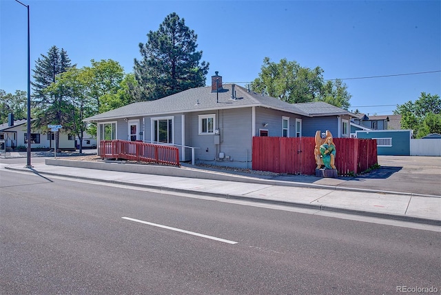 5723 Zephyr St, Arvada, CO 80002 - ranch-style home with a chimney