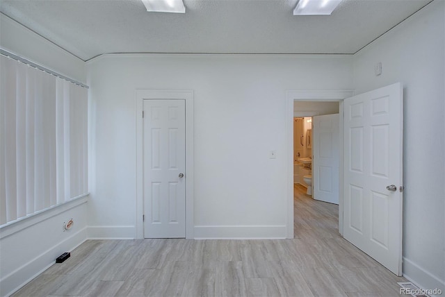 5723 Zephyr St, Arvada, CO 80002 - spare room with baseboards and light wood-style flooring