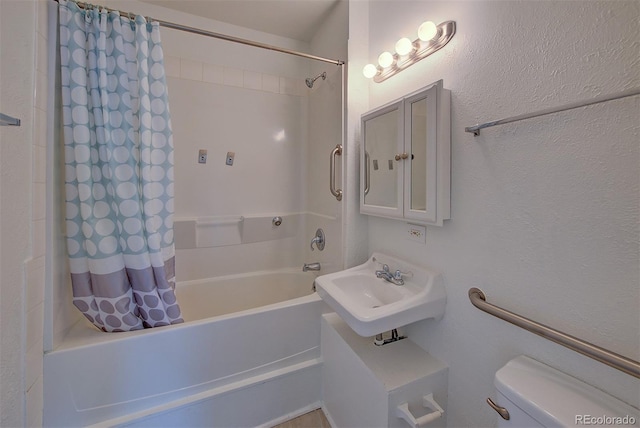 5723 Zephyr St, Arvada, CO 80002 - full bathroom with shower / bath combo with shower curtain, toilet, and a sink