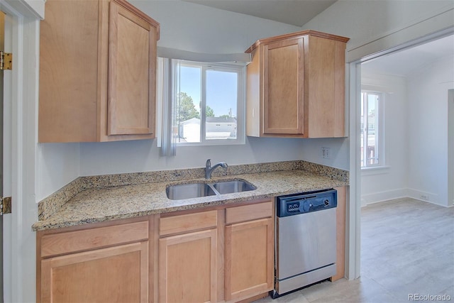 5723 Zephyr St, Arvada, CO 80002 - kitchen featuring stainless steel dishwasher, a sink, and light brown cabinetry