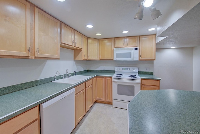 5723 Zephyr St, Arvada, CO 80002 - kitchen featuring white appliances, a sink, light brown cabinets, and recessed lighting