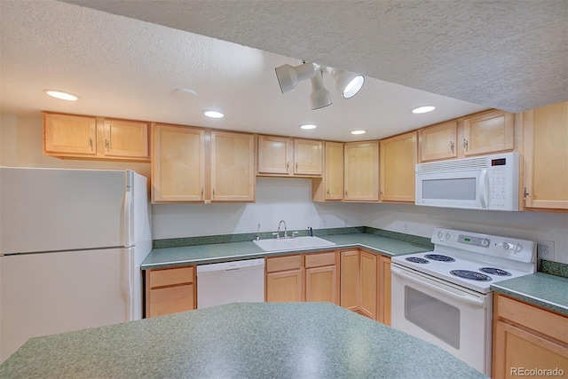 5723 Zephyr St, Arvada, CO 80002 - kitchen with white appliances, a sink, light brown cabinets, a textured ceiling, and recessed lighting