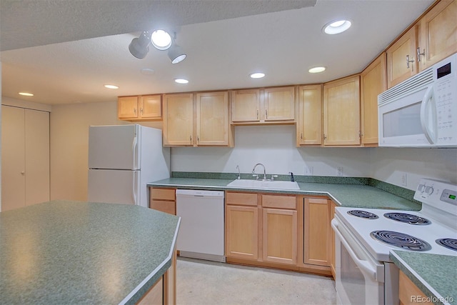 5723 Zephyr St, Arvada, CO 80002 - kitchen featuring white appliances, a sink, light brown cabinets, and recessed lighting