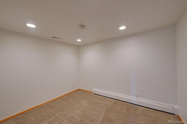 5723 Zephyr St, Arvada, CO 80002 - carpeted spare room with a baseboard radiator, recessed lighting, baseboards, and a smoke detector
