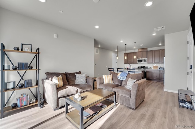 living room with light wood-type flooring