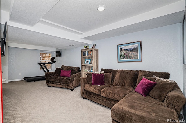 6039 S Ukraine Cir, Aurora, CO 80015 - living area with carpet, baseboards, and a textured ceiling