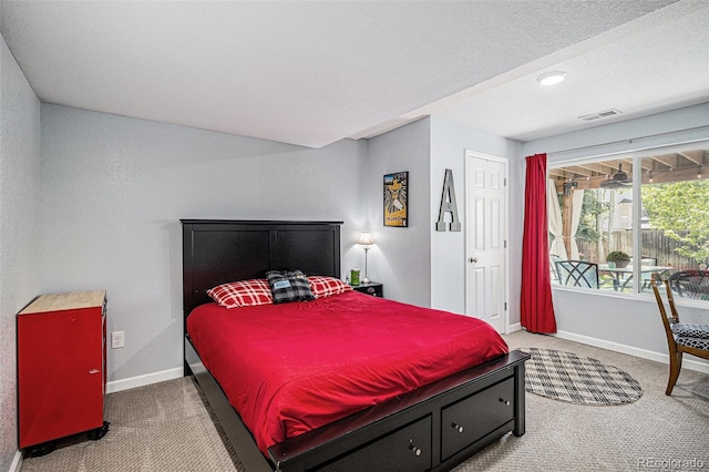 6039 S Ukraine Cir, Aurora, CO 80015 - carpeted bedroom with access to exterior and baseboards