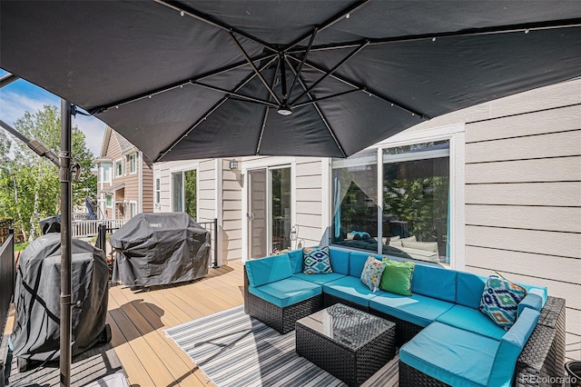 6039 S Ukraine Cir, Aurora, CO 80015 - wooden deck featuring an outdoor hangout area and area for grilling