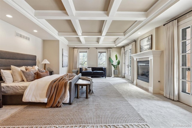 carpeted bedroom featuring recessed lighting, coffered ceiling, visible vents, beam ceiling, and a glass covered fireplace