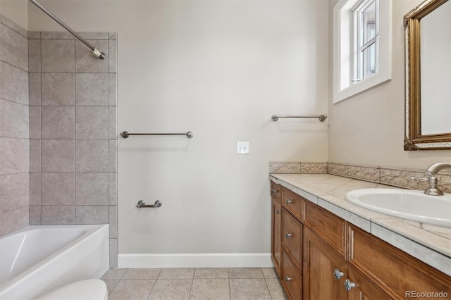 full bath featuring shower / tub combination, toilet, tile patterned flooring, vanity, and baseboards