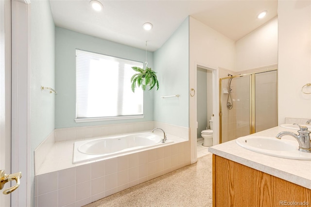 935 Green Gables Cir, Bennett, CO 80102 - full bathroom with a stall shower, a garden tub, double vanity, speckle patterned floor, and recessed lighting