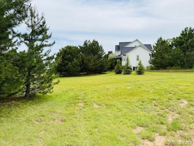 935 Green Gables Cir, Bennett, CO 80102 - view of grassy yard