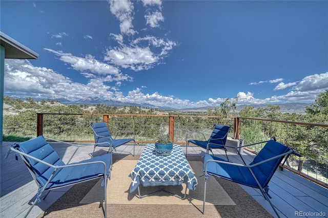 6644 County Road 110, Salida, CO 81201 - view of patio / terrace featuring a deck with mountain view and an outdoor living space