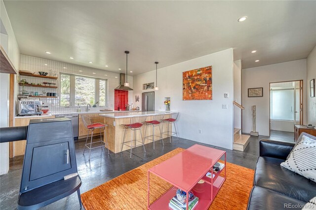 6644 County Road 110, Salida, CO 81201 - living area with finished concrete floors, recessed lighting, and stairs