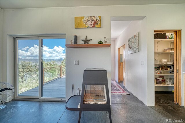 6644 County Road 110, Salida, CO 81201 - office space with finished concrete flooring and a wood stove