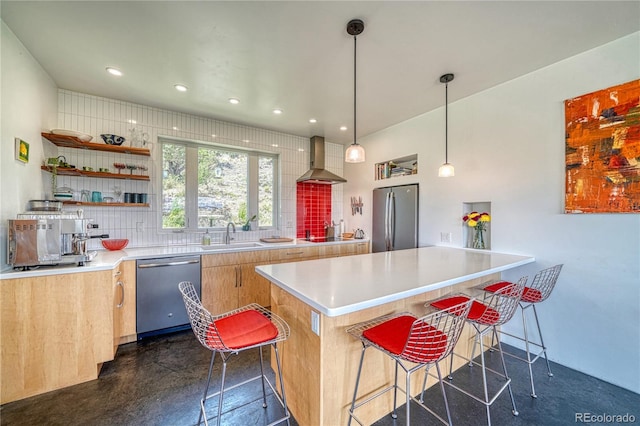 6644 County Road 110, Salida, CO 81201 - kitchen featuring appliances with stainless steel finishes, wall chimney range hood, open shelves, a kitchen breakfast bar, and recessed lighting