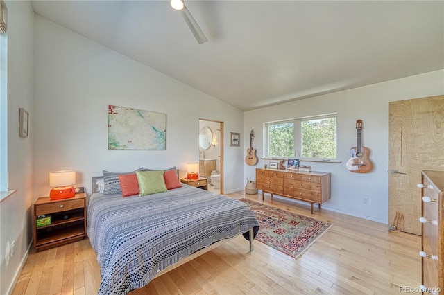 6644 County Road 110, Salida, CO 81201 - bedroom with lofted ceiling, hardwood / wood-style flooring, a ceiling fan, and connected bathroom
